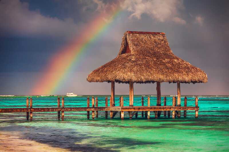 overwater pier with rainbow